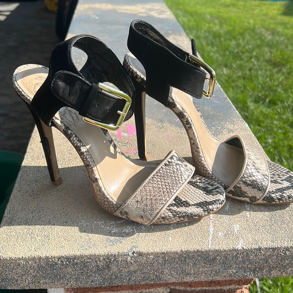 Size 7.5 blank and snake skin heels